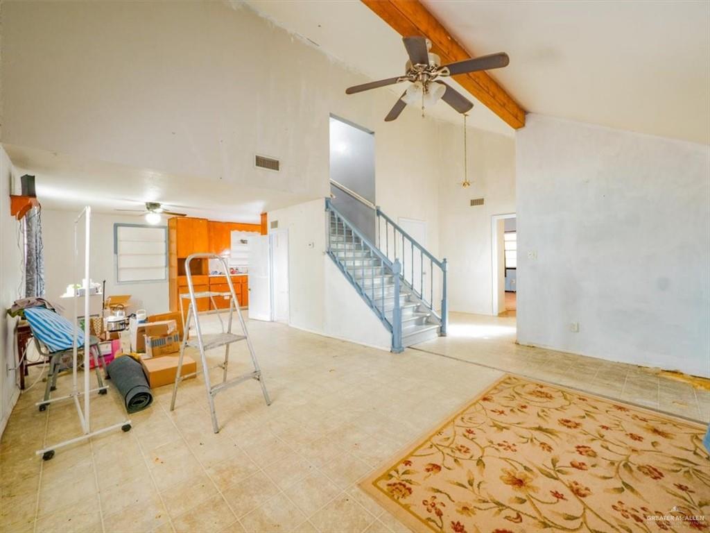 23067 Cragon Road Harlingen, TX 78552 - Photo 12 of 28 a view of a livingroom with furniture and staircase