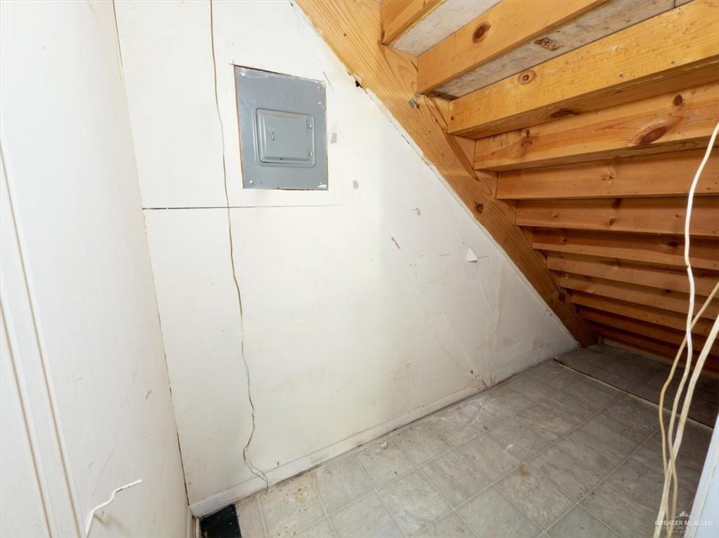 23067 Cragon Road Harlingen, TX 78552 - Photo 13 of 28 a view of a room with racks on the wall