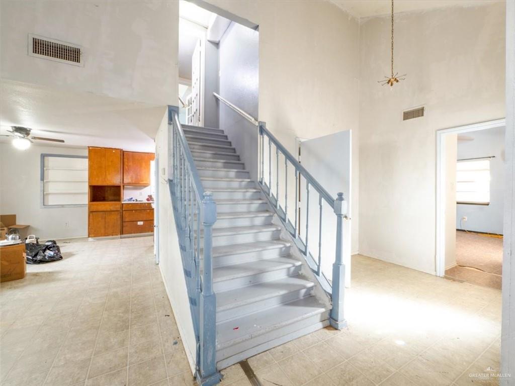 23067 Cragon Road Harlingen, TX 78552 - Photo 16 of 28 a view of entryway and hall with wooden floor