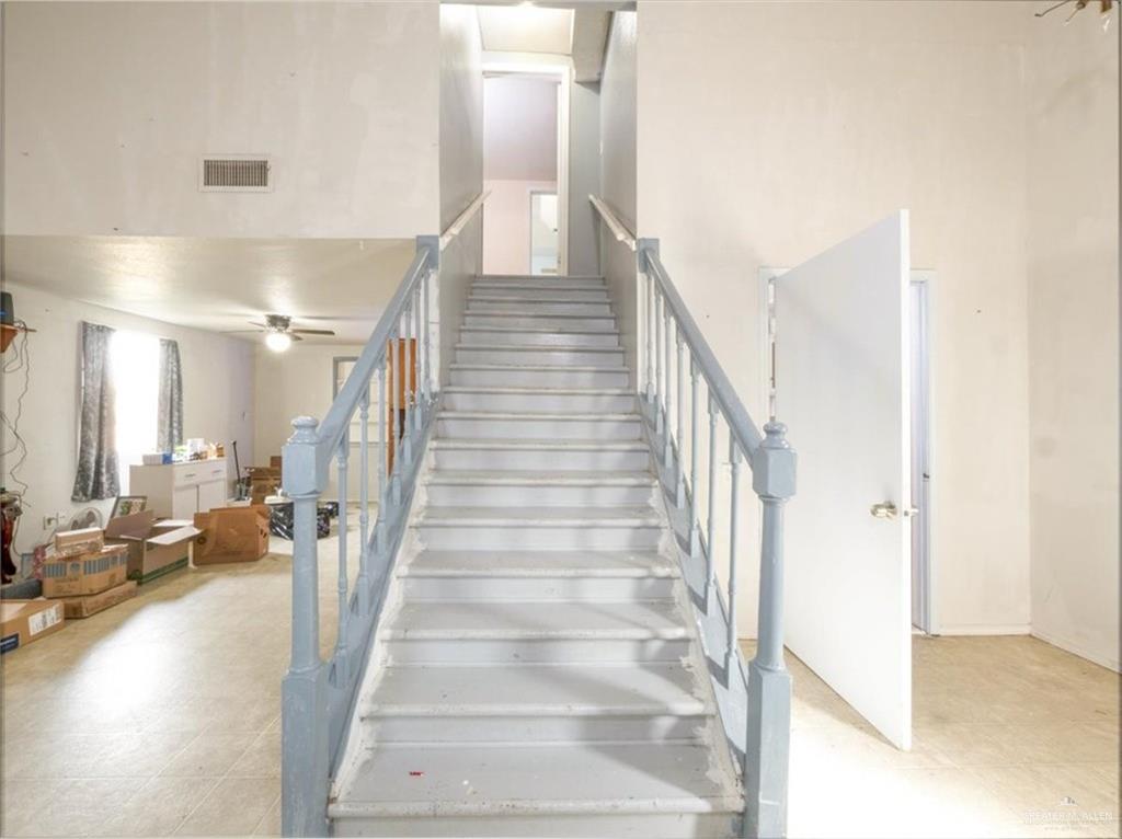 23067 Cragon Road Harlingen, TX 78552 - Photo 17 of 28 a view of entryway and hall with wooden floor