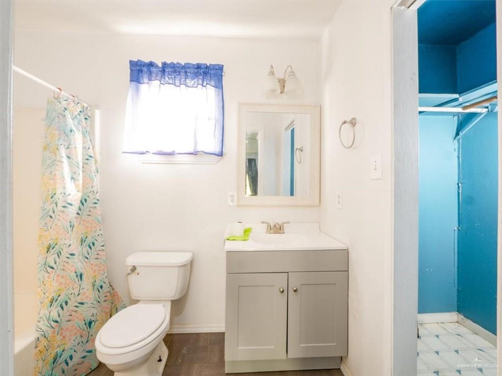 23067 Cragon Road Harlingen, TX 78552 - Photo 20 of 28 a bathroom with a sink a toilet and shower