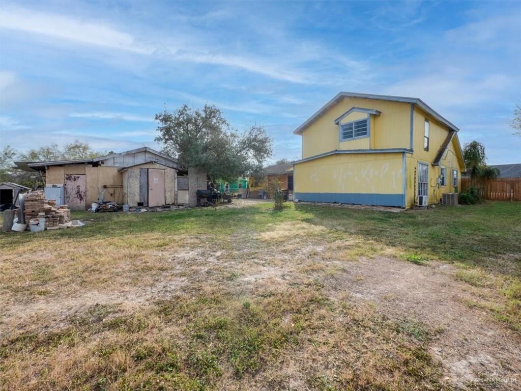 23067 Cragon Road Harlingen, TX 78552 - Photo 25 of 28 a view of a house with a yard