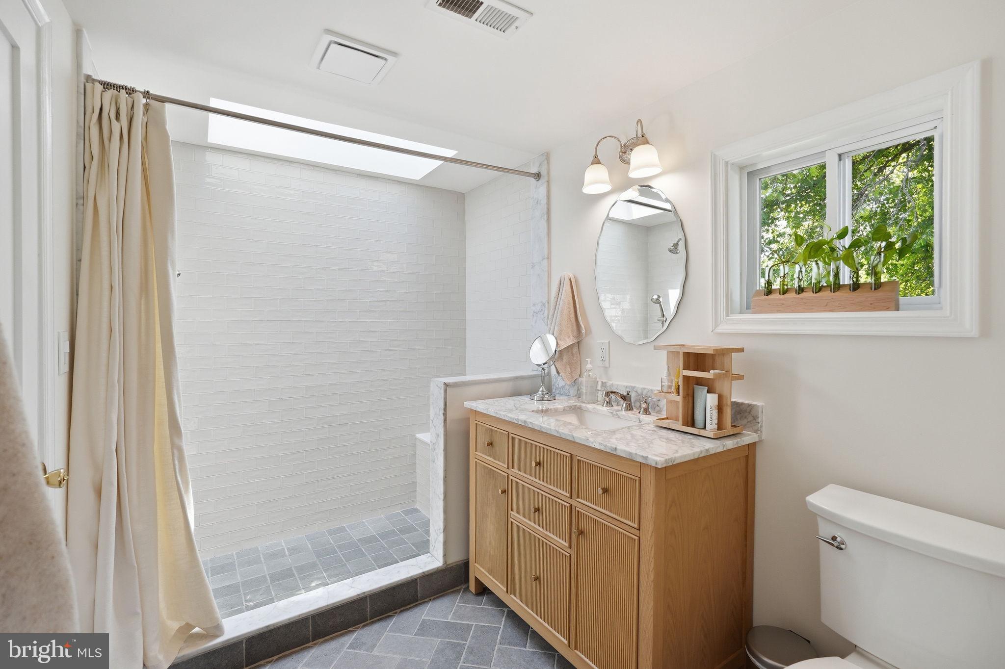 1811 Ednor Road Silver Spring, MD 20905 - Photo 19 of 39 Renovated full bath connected to primary