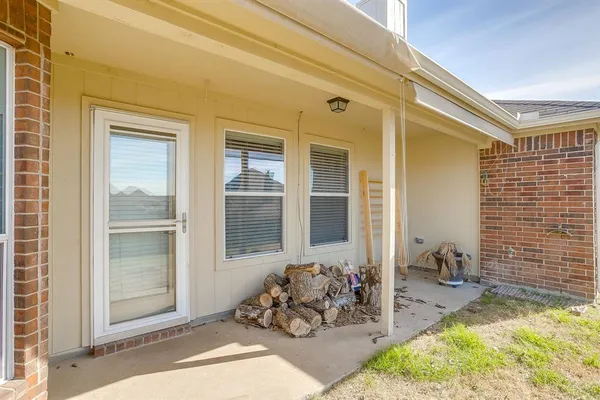 a front view of a house with outdoor space