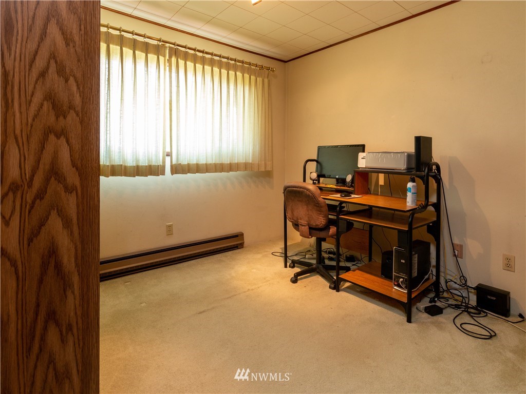 659 Spencer Road Toledo, WA 98591 - Photo 13 of 25 a view of a workspace with furniture and a window