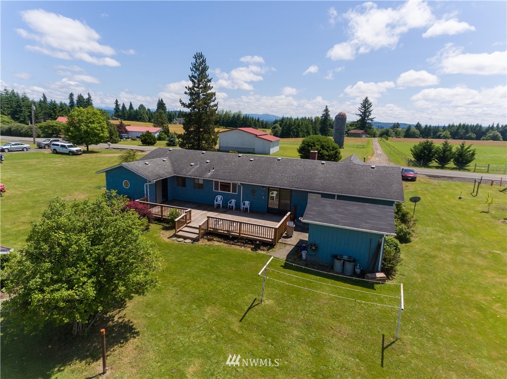 659 Spencer Road Toledo, WA 98591 - Photo 15 of 25 an aerial view of a house with a garden and lake view