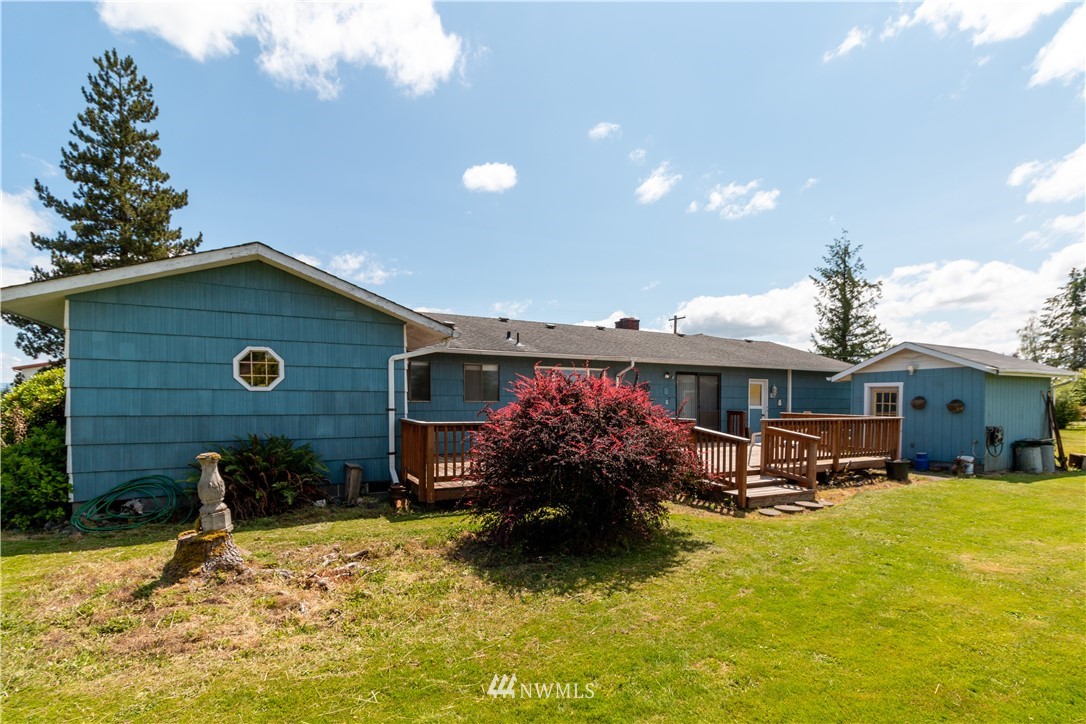 659 Spencer Road Toledo, WA 98591 - Photo 18 of 25 a front view of a house with a yard
