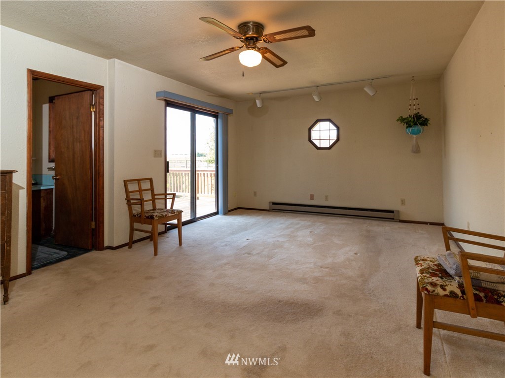 659 Spencer Road Toledo, WA 98591 - Photo 10 of 25 a view of an empty room with a window