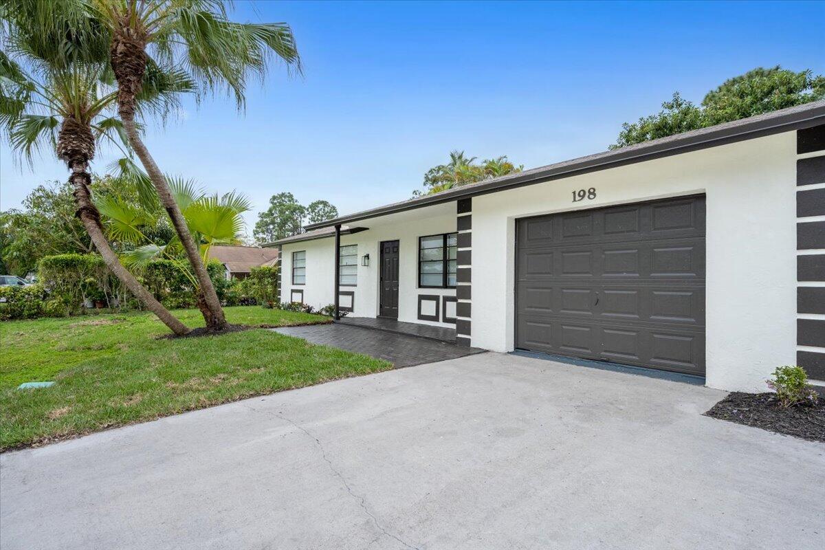 198 Bobwhite Road Royal Palm Beach, FL 33411 - Photo 2 of 30 03-DSC_7030-Edit