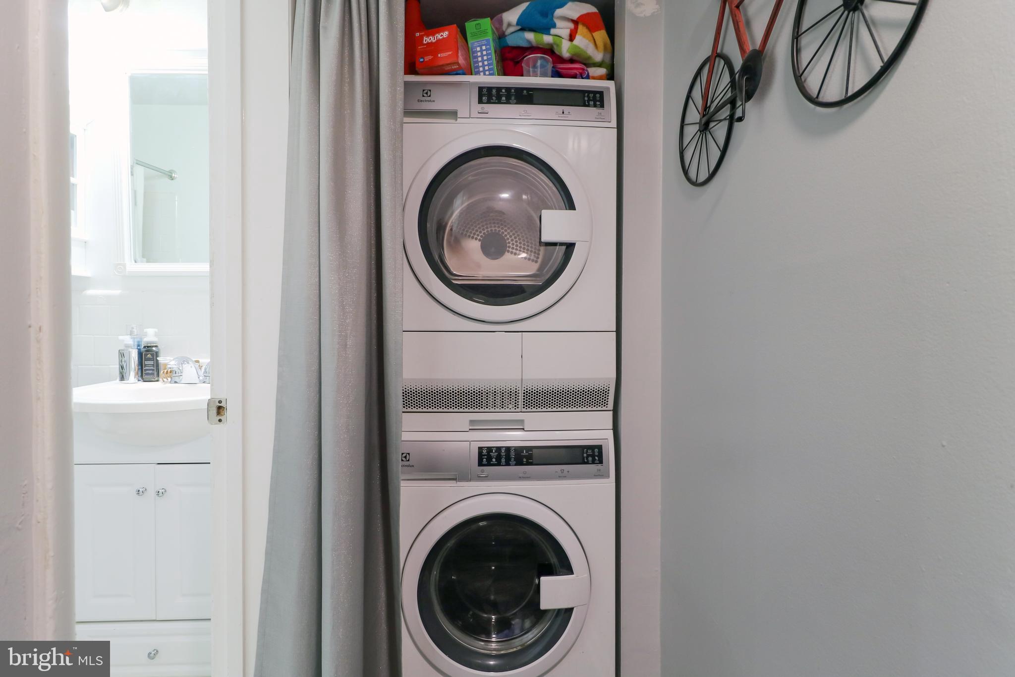 3210 South 28th Street, Unit 404 Alexandria, VA 22302 - Photo 21 of 25 a view of a washer and dryer in a utility room