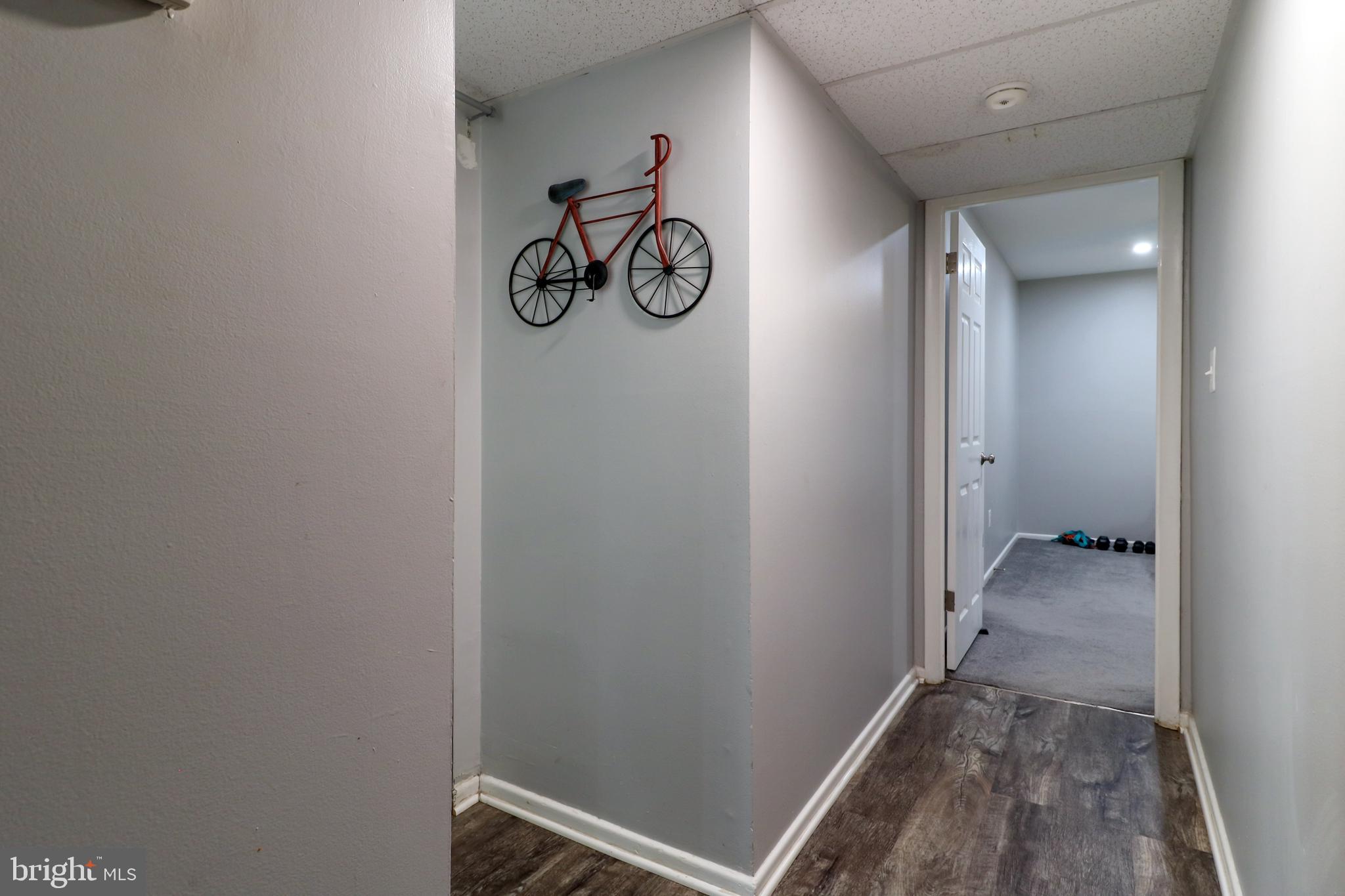 3210 South 28th Street, Unit 404 Alexandria, VA 22302 - Photo 23 of 25 a view of a hallway with wooden floor
