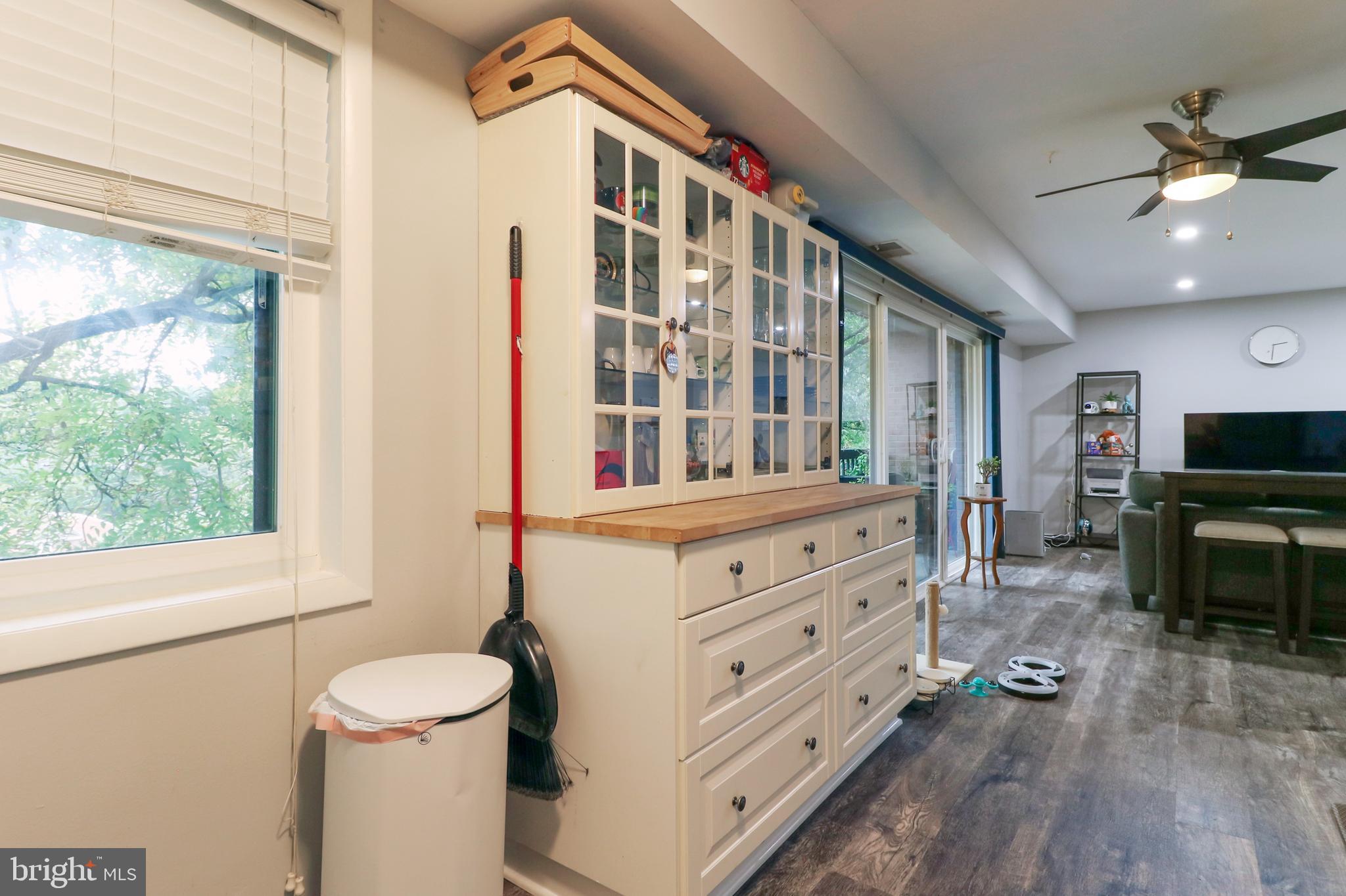 3210 South 28th Street, Unit 404 Alexandria, VA 22302 - Photo 5 of 25 a view of living room with furniture and flat screen tv