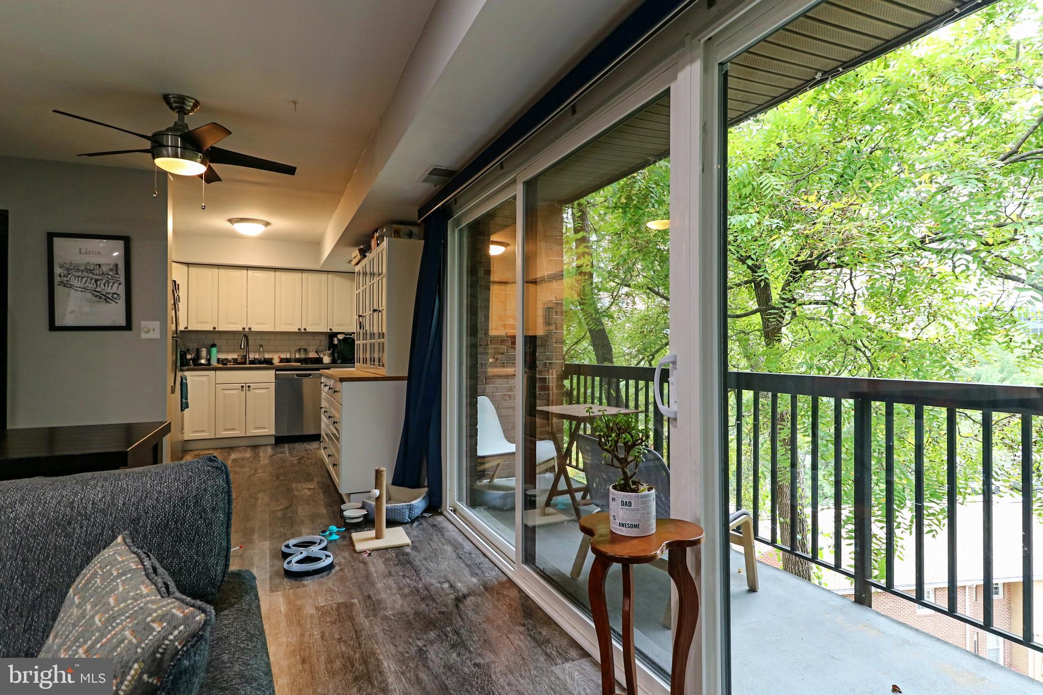 3210 South 28th Street, Unit 404 Alexandria, VA 22302 - Photo 9 of 25 a view of a living room and dining room