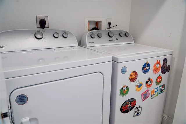a utility room with dryer and washer