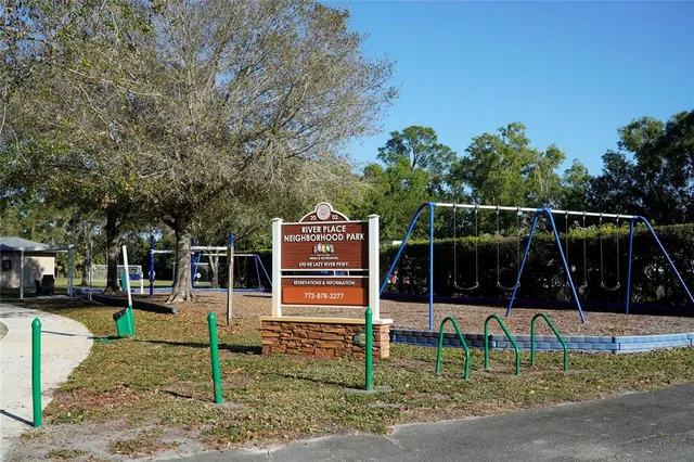 a view of a yard with large tree