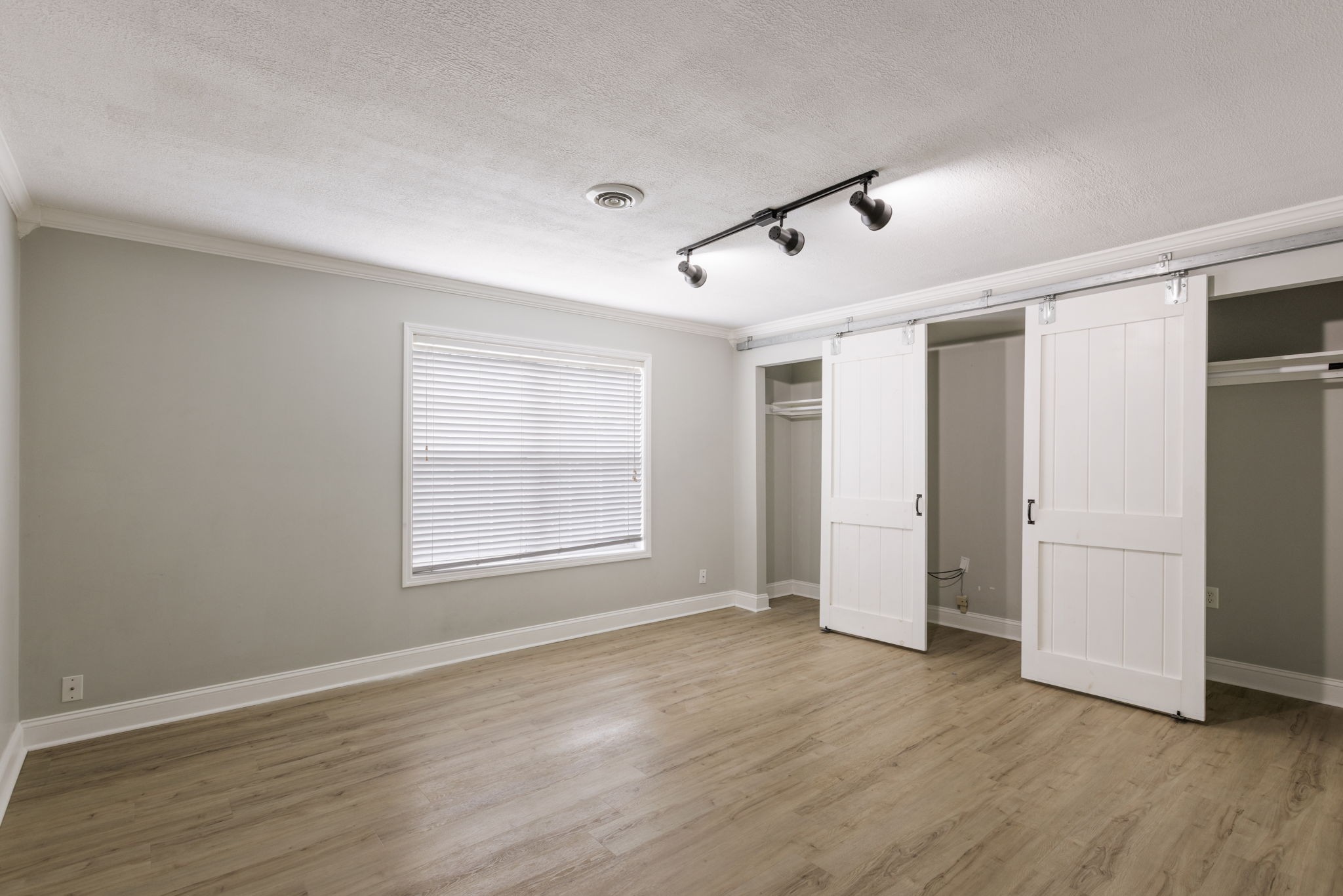 2505 Preston Way Spring Hill, TN 37174 - Photo 16 of 37 a view of an empty room with wooden floor and a window