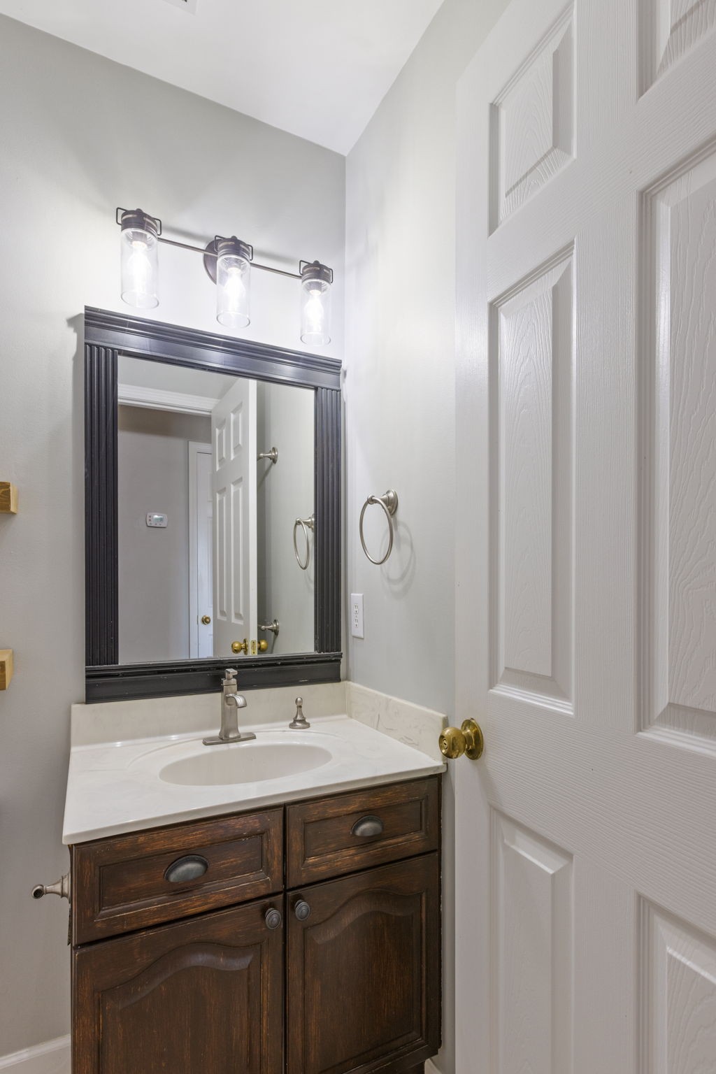 2505 Preston Way Spring Hill, TN 37174 - Photo 18 of 37 a bathroom with a double vanity sink and a mirror