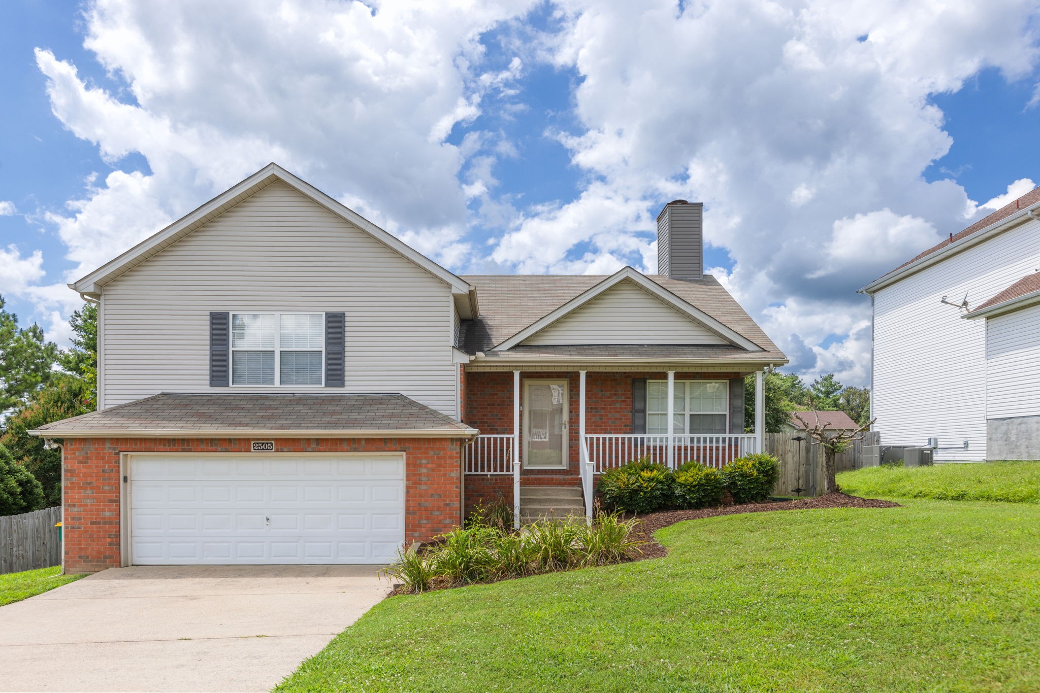 2505 Preston Way Spring Hill, TN 37174 - Photo 2 of 37 a view of a house with yard and a garden