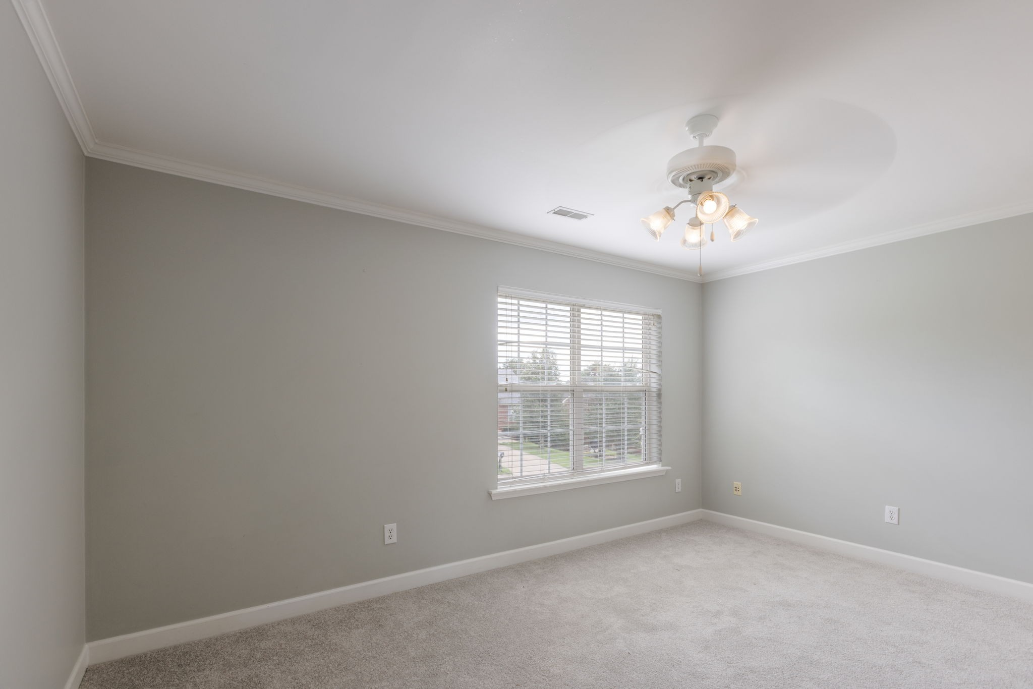 2505 Preston Way Spring Hill, TN 37174 - Photo 23 of 37 an empty room with windows and chandelier fan