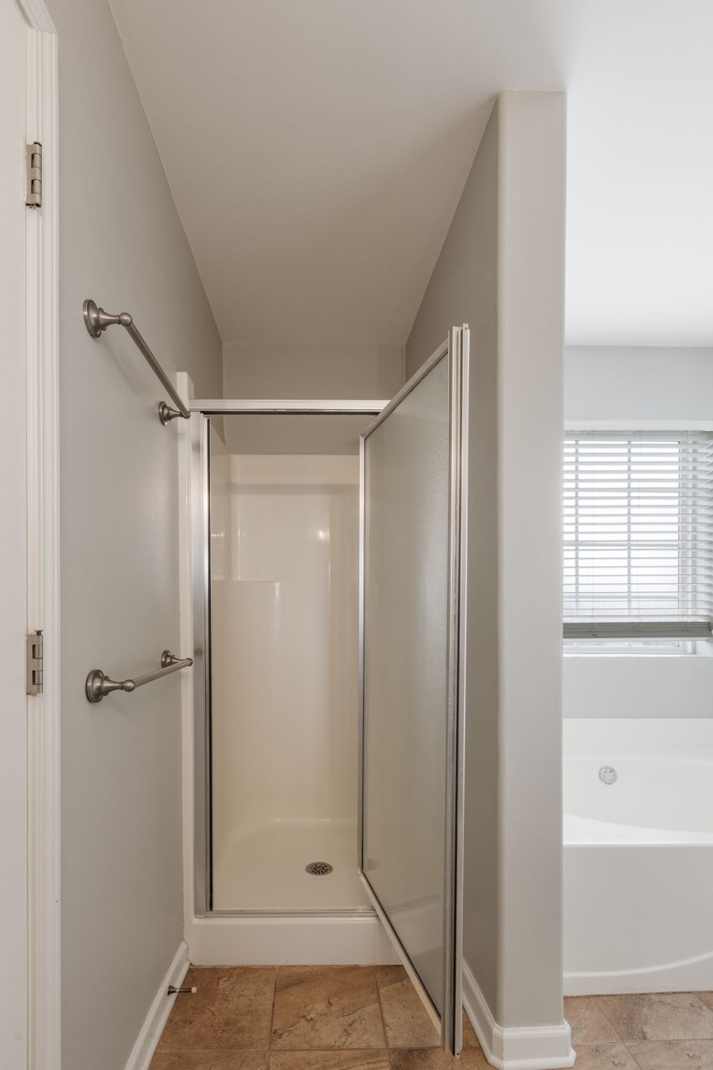 2505 Preston Way Spring Hill, TN 37174 - Photo 26 of 37 a bathroom with a glass shower door