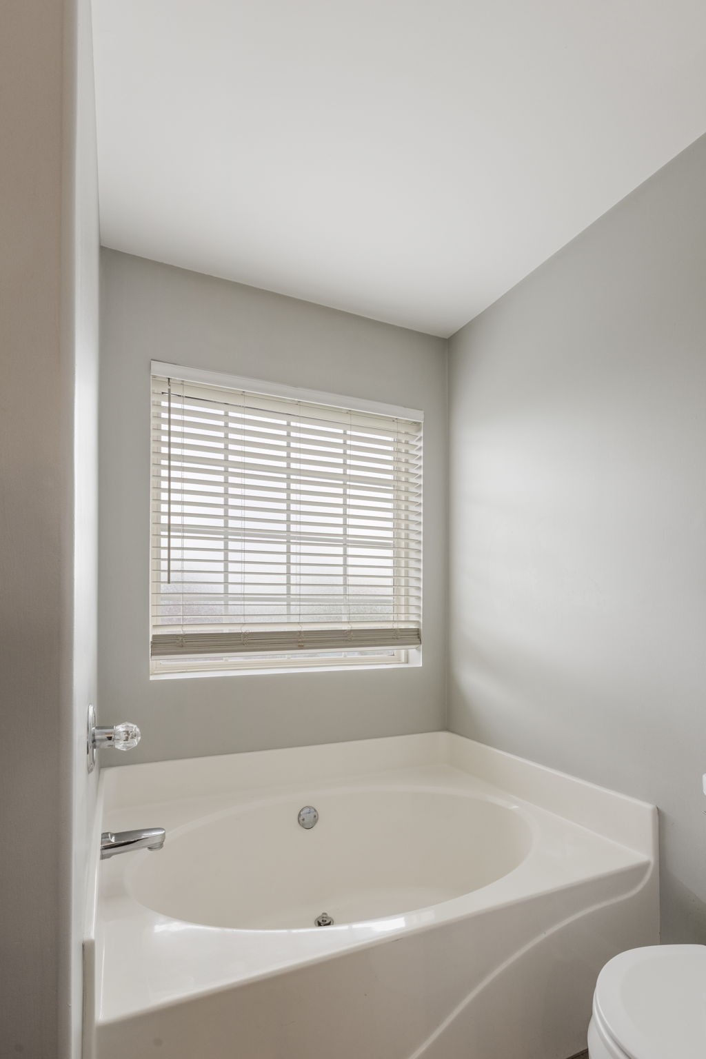2505 Preston Way Spring Hill, TN 37174 - Photo 29 of 37 a white bath tub sitting next to a white toilet