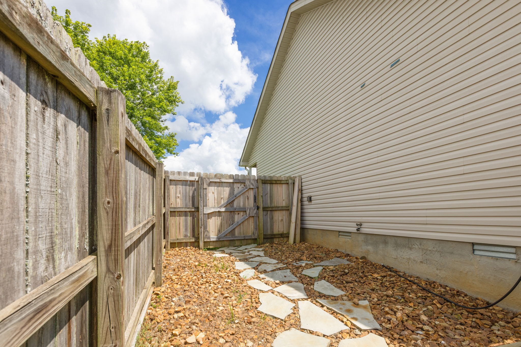 2505 Preston Way Spring Hill, TN 37174 - Photo 31 of 37 a view of a house with a backyard