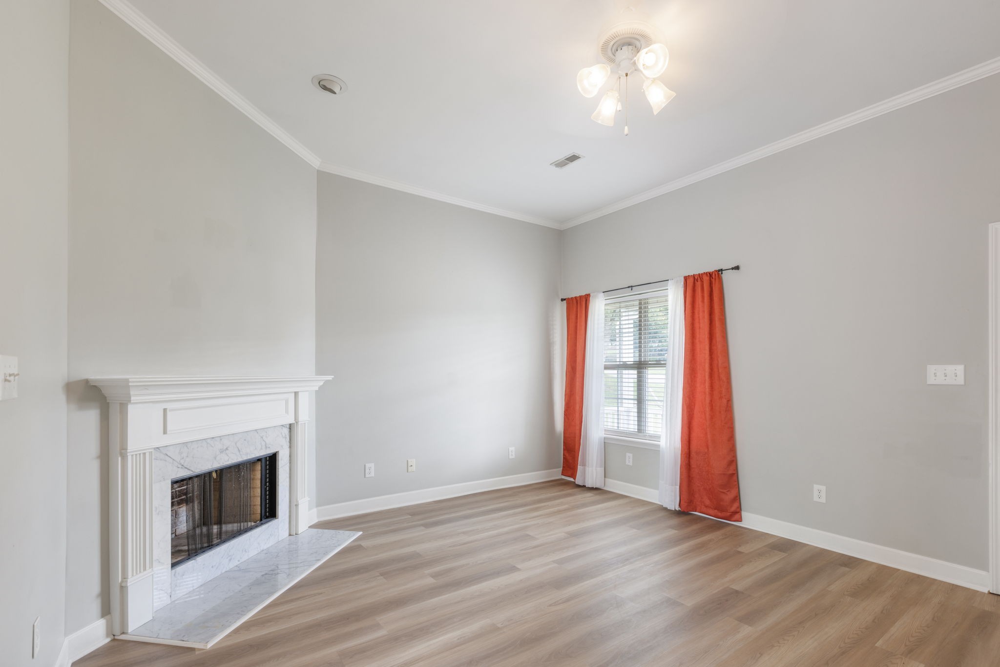 2505 Preston Way Spring Hill, TN 37174 - Photo 9 of 37 a view of an empty room with window and fire place