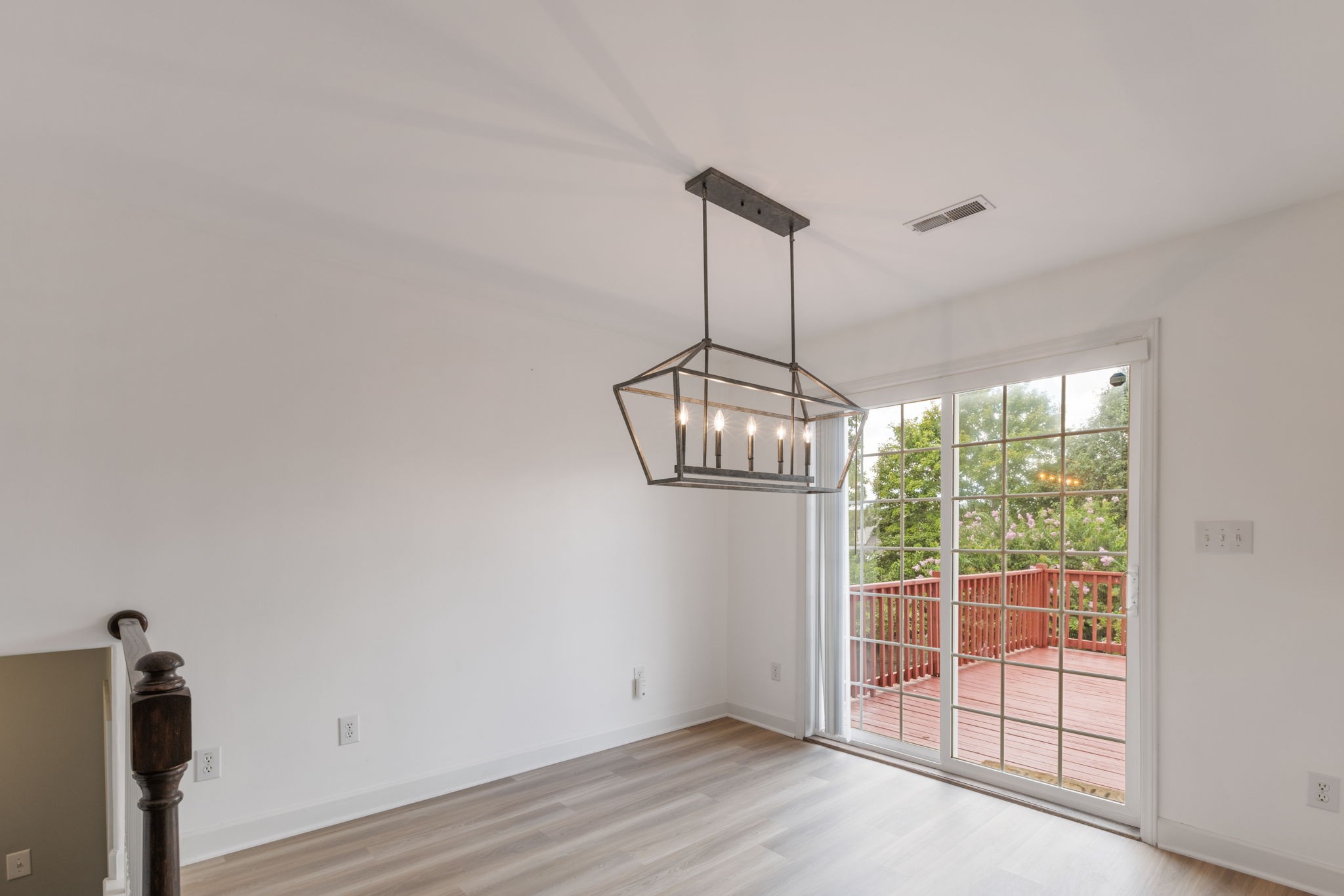 2505 Preston Way Spring Hill, TN 37174 - Photo 10 of 37 a view of a room with window wooden floor and chandelier