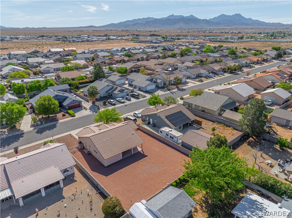 3973 Prairie View Drive Kingman, AZ 86409 - Photo 10 of 34 Aerial view of the neighborhood showcasing residential properties and a distant mountainous landscape