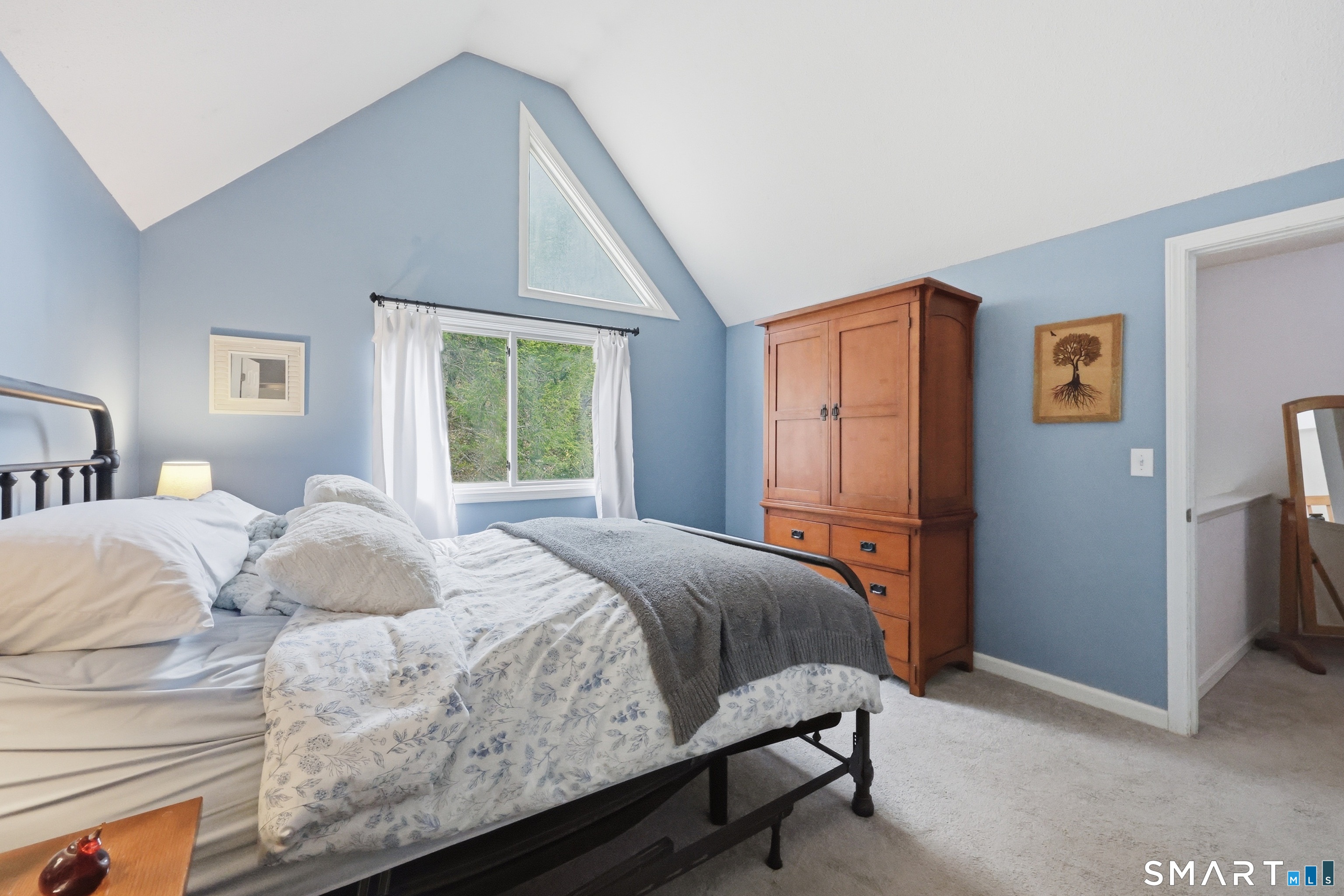 2 Rivermead, Unit 2 Avon, CT 06001 - Photo 17 of 36 a bedroom with a bed and a window