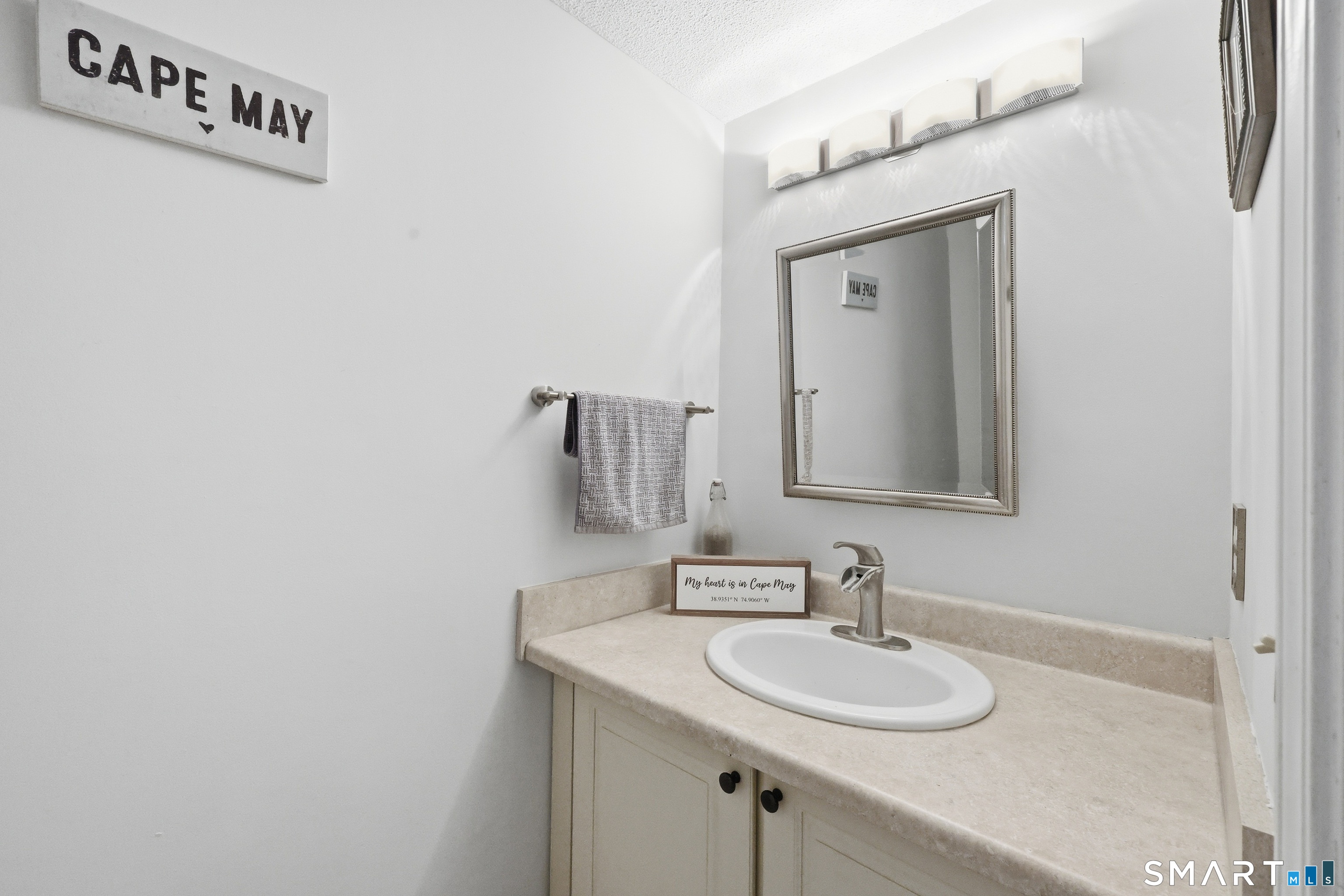 2 Rivermead, Unit 2 Avon, CT 06001 - Photo 20 of 36 a bathroom with a sink and a mirror