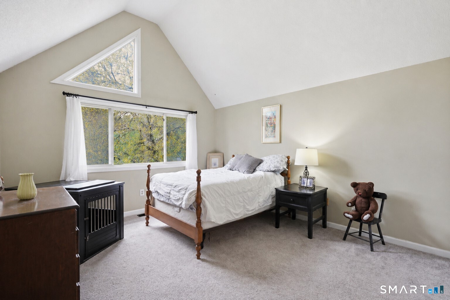 2 Rivermead, Unit 2 Avon, CT 06001 - Photo 23 of 36 a bedroom with a bed and a table in it