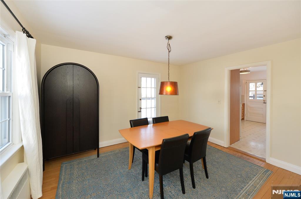 87 Grayson Place Teaneck, NJ 07666 - Photo 4 of 20 a workspace with furniture and window