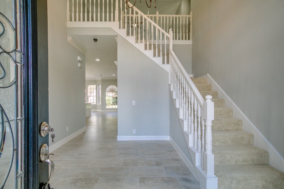 6302 Laver Love Drive Spring, TX 77379 - Photo 3 of 38 a view of entryway and hall with wooden floor