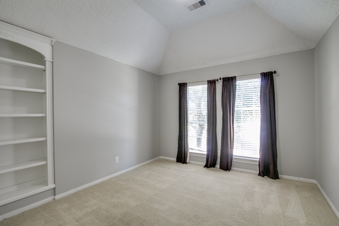 6302 Laver Love Drive Spring, TX 77379 - Photo 35 of 38 an empty room with windows and closet