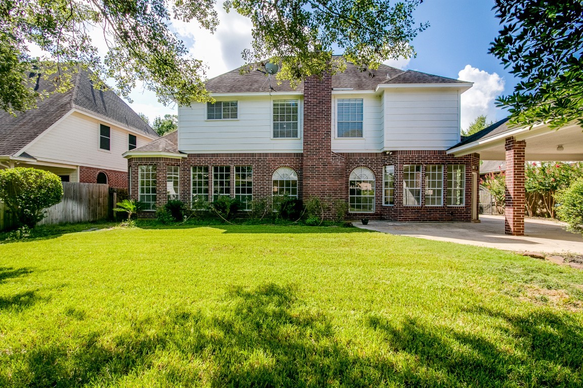 6302 Laver Love Drive Spring, TX 77379 - Photo 38 of 38 front view of a house with a yard