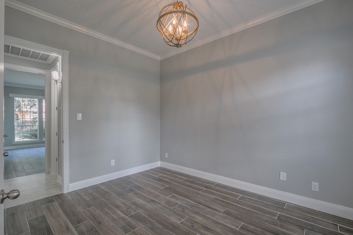 6302 Laver Love Drive Spring, TX 77379 - Photo 4 of 38 wooden floor in an empty room