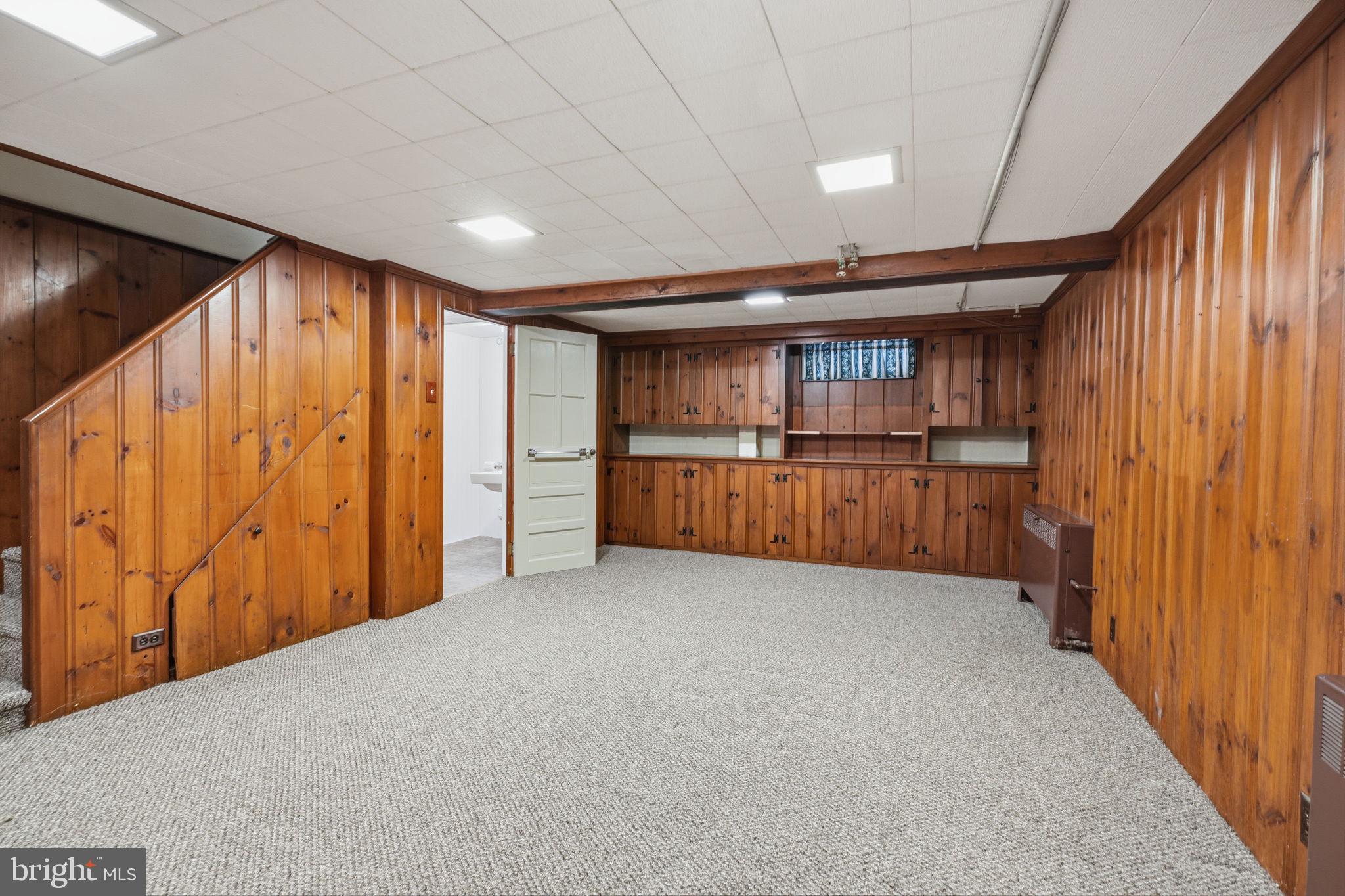 404 Old Farm Road Wyncote, PA 19095 - Photo 36 of 41 Cozy basement with warm wood accents.