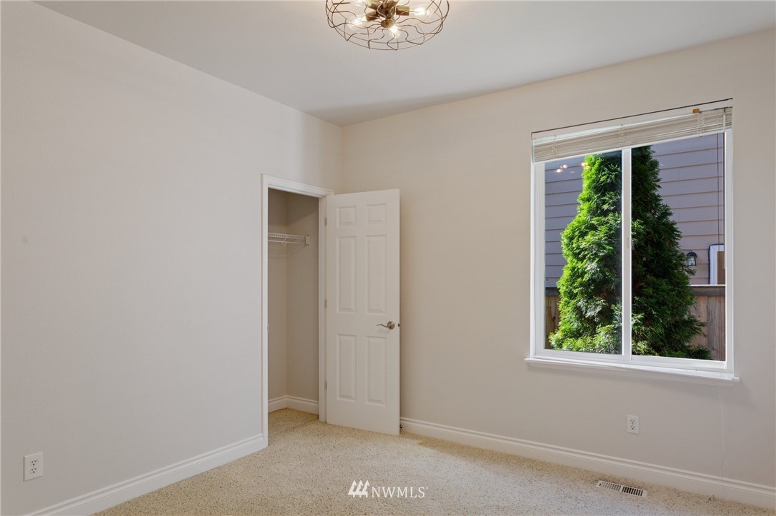 17264 Southeast 185th Street Renton, WA 98058 - Photo 17 of 40 an empty room with a window
