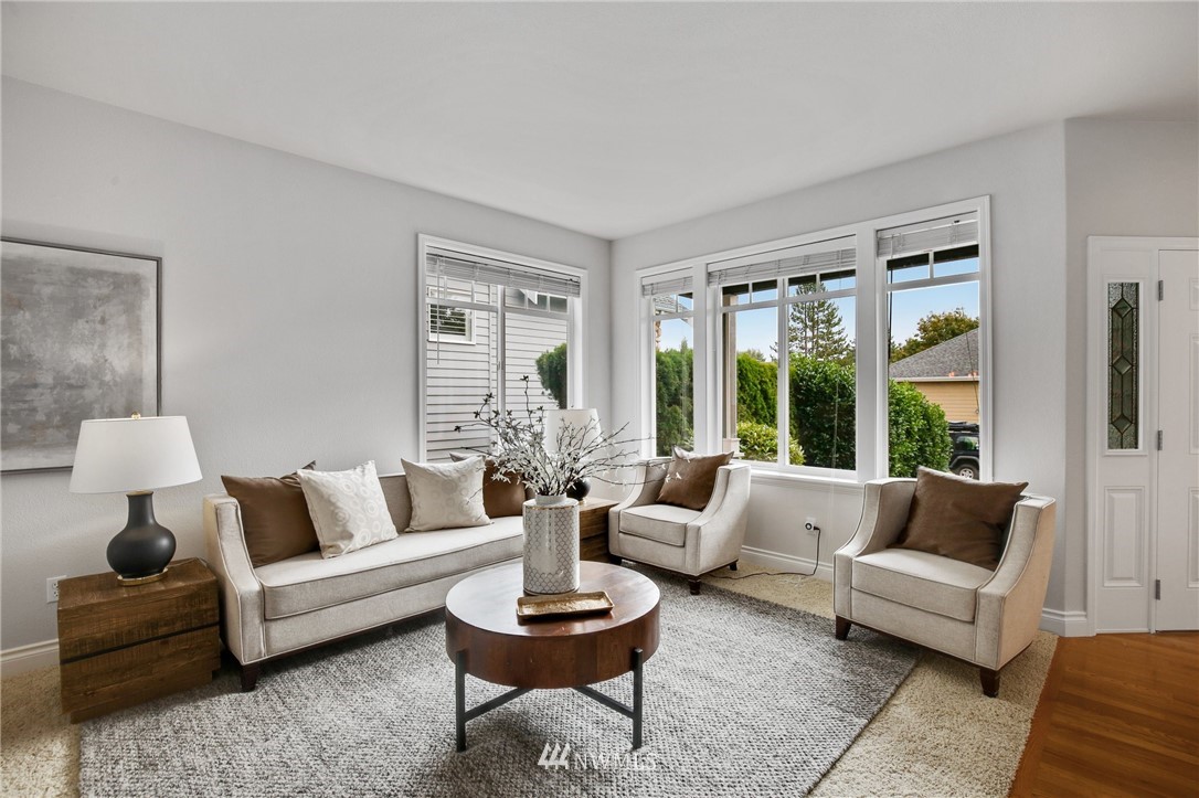 17264 Southeast 185th Street Renton, WA 98058 - Photo 2 of 40 a living room with furniture and a large window