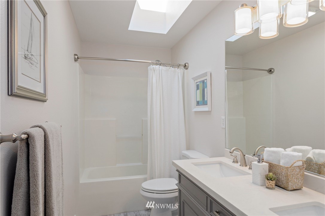 17264 Southeast 185th Street Renton, WA 98058 - Photo 34 of 40 a bathroom with a sink toilet and shower