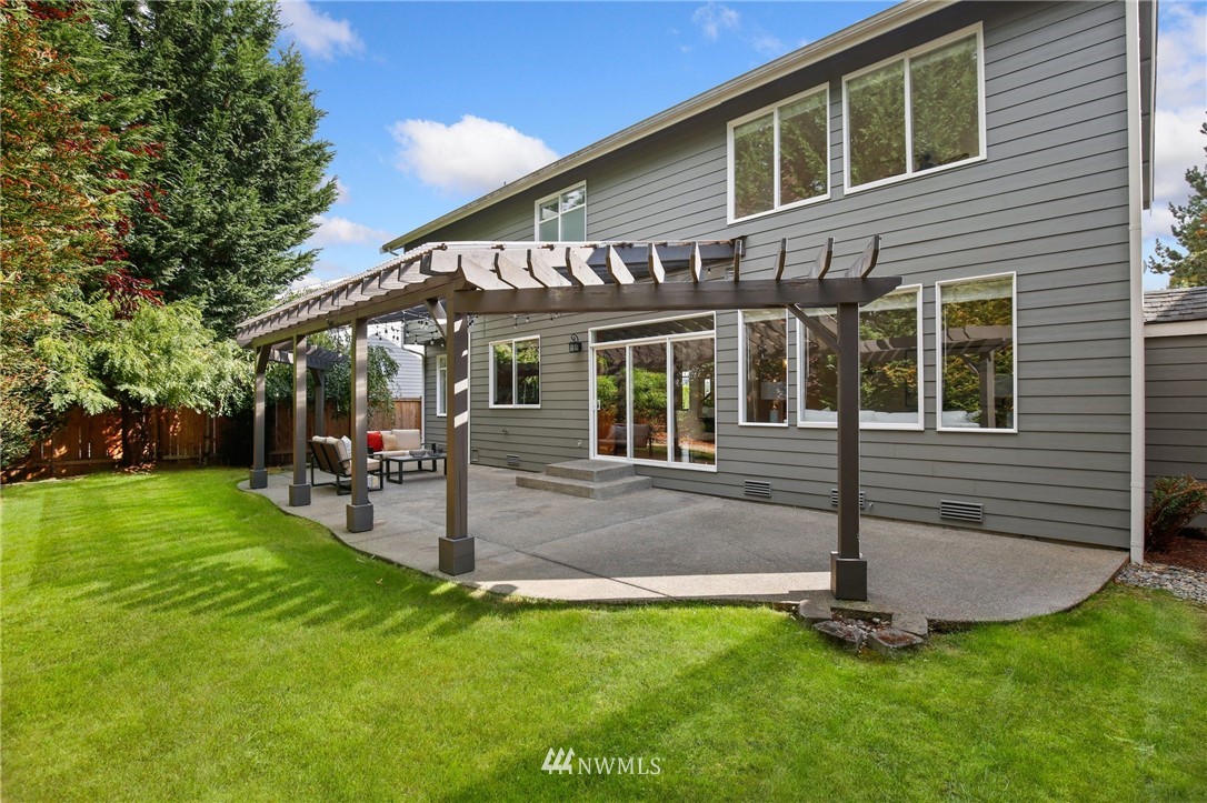 17264 Southeast 185th Street Renton, WA 98058 - Photo 36 of 40 a view of a house with a yard porch and sitting area