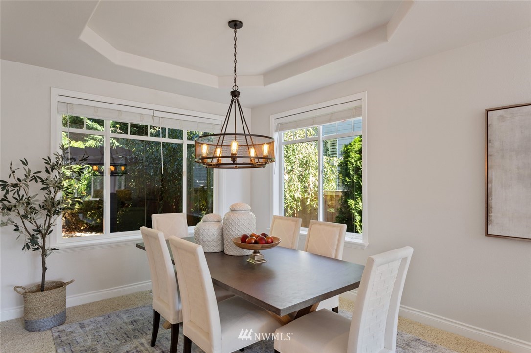 17264 Southeast 185th Street Renton, WA 98058 - Photo 5 of 40 a view of a dining room with furniture window and outside view