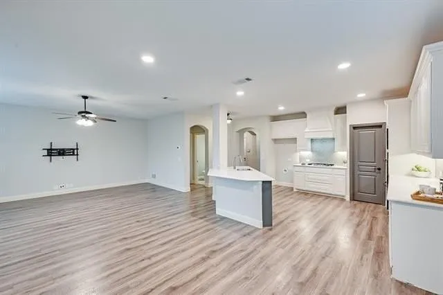 a view of kitchen with wooden floor