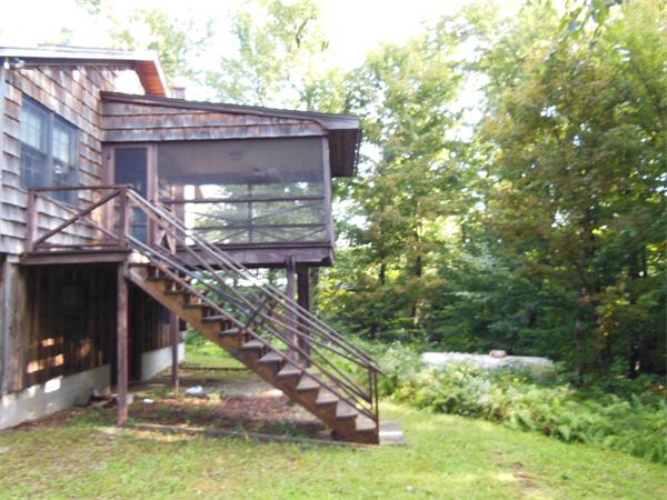 76 Slope Road Tolland, MA 01034 - Photo 5 of 11 a small pool with a roof deck