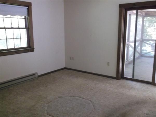 76 Slope Road Tolland, MA 01034 - Photo 8 of 11 an empty room with windows