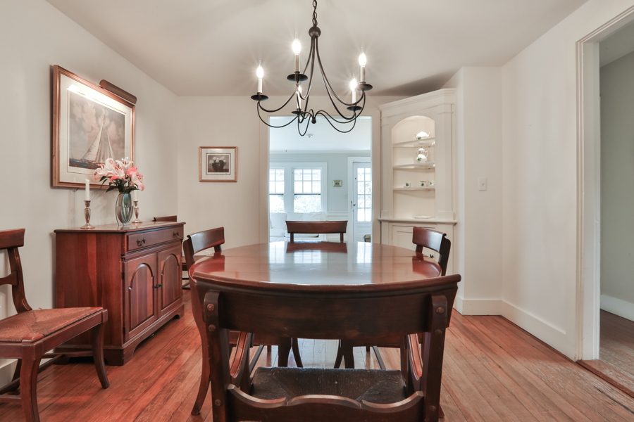 37 West Tisbury Road Edgartown, MA 02539 - Photo 13 of 45 a view of a dining room with furniture window and wooden floor