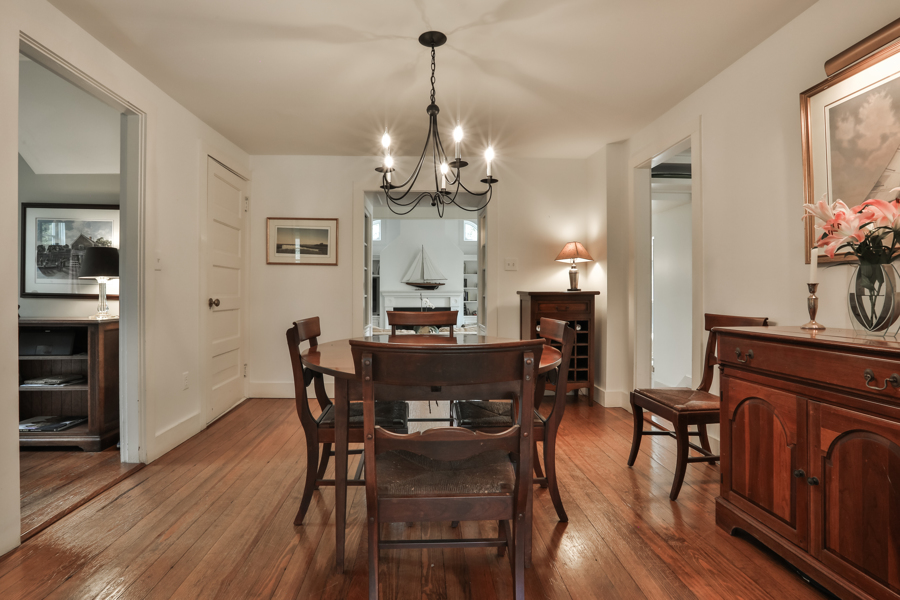 37 West Tisbury Road Edgartown, MA 02539 - Photo 14 of 45 a view of a dining room with furniture and wooden floor