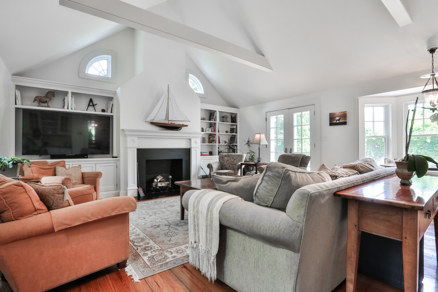 37 West Tisbury Road Edgartown, MA 02539 - Photo 18 of 45 a living room with furniture fireplace and flat screen tv