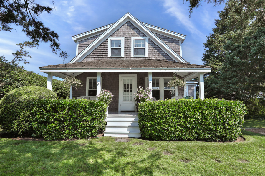 37 West Tisbury Road Edgartown, MA 02539 - Photo 2 of 45 a front view of a house with a yard